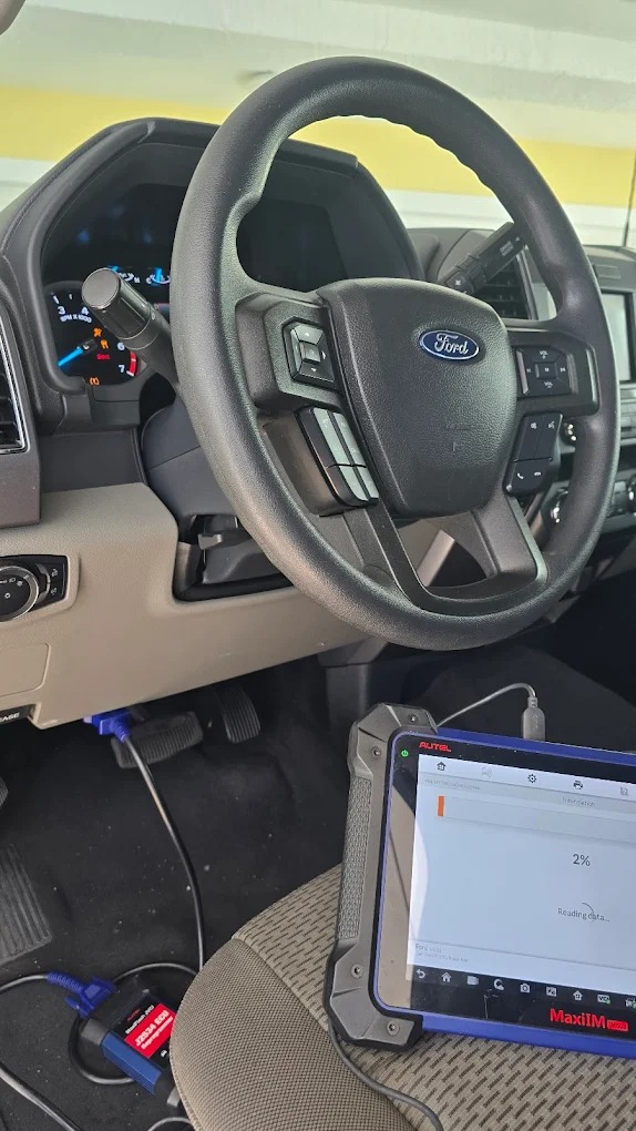 Mobile locksmith service truck arriving at car lockout location